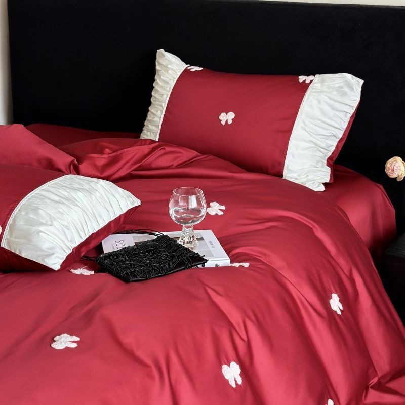 VILZSTUDIOS deep red or blush pink satin duvet cover set with embroidered bows and ivory ruffled pillowcases