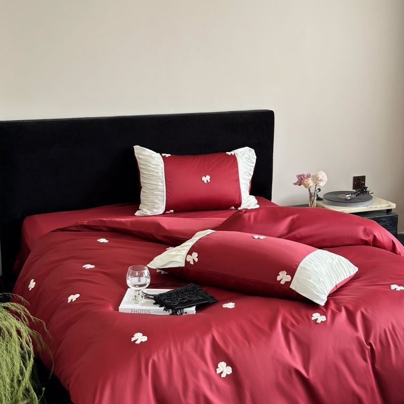 VILZSTUDIOS deep red or blush pink satin duvet cover set with embroidered bows and ivory ruffled pillowcases