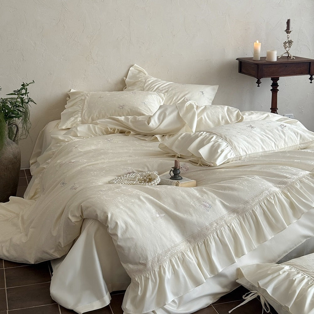 VILZSTUDIOS blush pink butterfly and floral embroidered bedding set with lace borders and gathered ruffles
