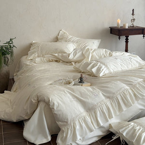 VILZSTUDIOS blush pink butterfly and floral embroidered bedding set with lace borders and gathered ruffles