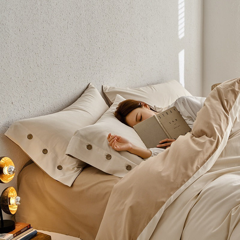 VILZSTUDIOS neutral and pastel two-tone duvet cover set with round button details on pillowcases