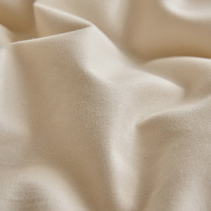 VILZSTUDIOS neutral and pastel two-tone duvet cover set with round button details on pillowcases