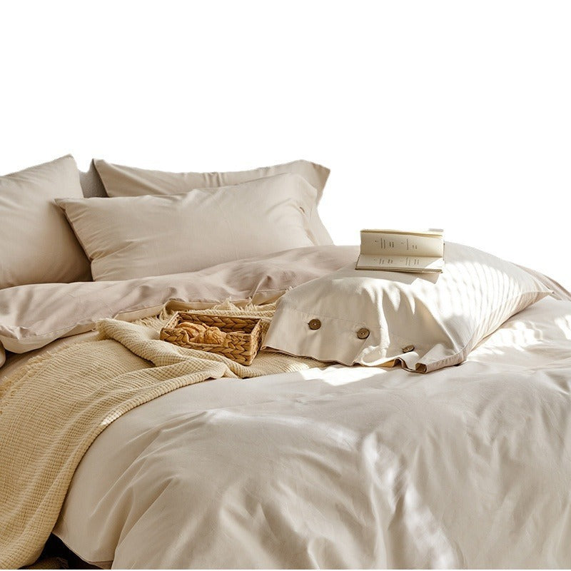 VILZSTUDIOS neutral and pastel two-tone duvet cover set with round button details on pillowcases