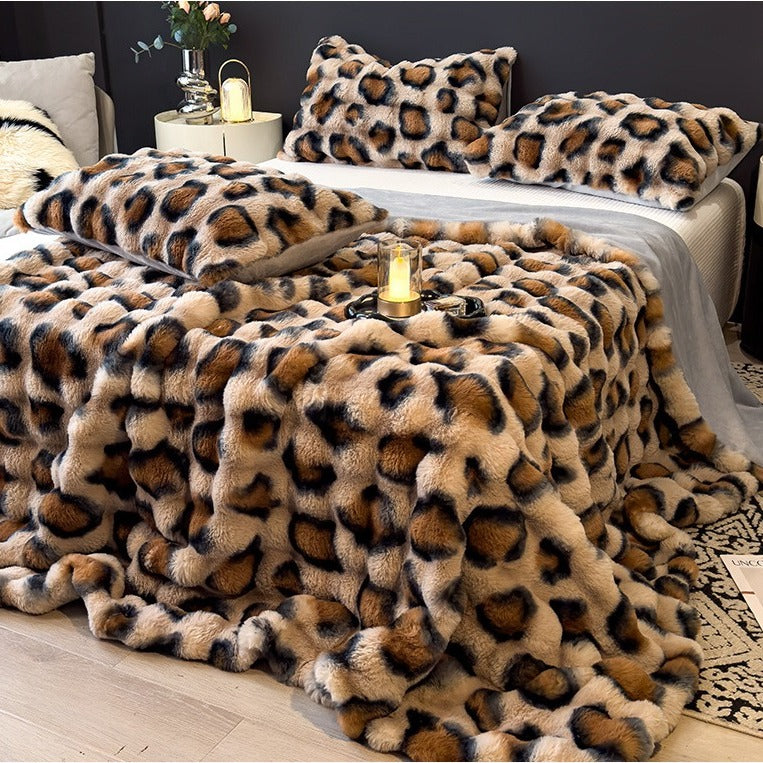 VILZSTUDIOS faux-fur throw blanket with carved channel texture in leopard, pink patterned, and neutral gray options