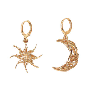 VILZSTUDIOS Mismatched earrings featuring a crescent moon and sun design