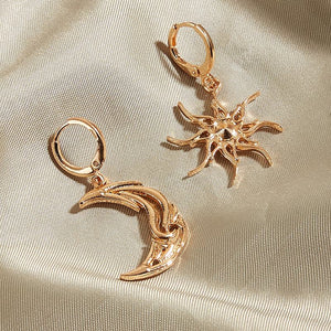 VILZSTUDIOS Mismatched earrings featuring a crescent moon and sun design