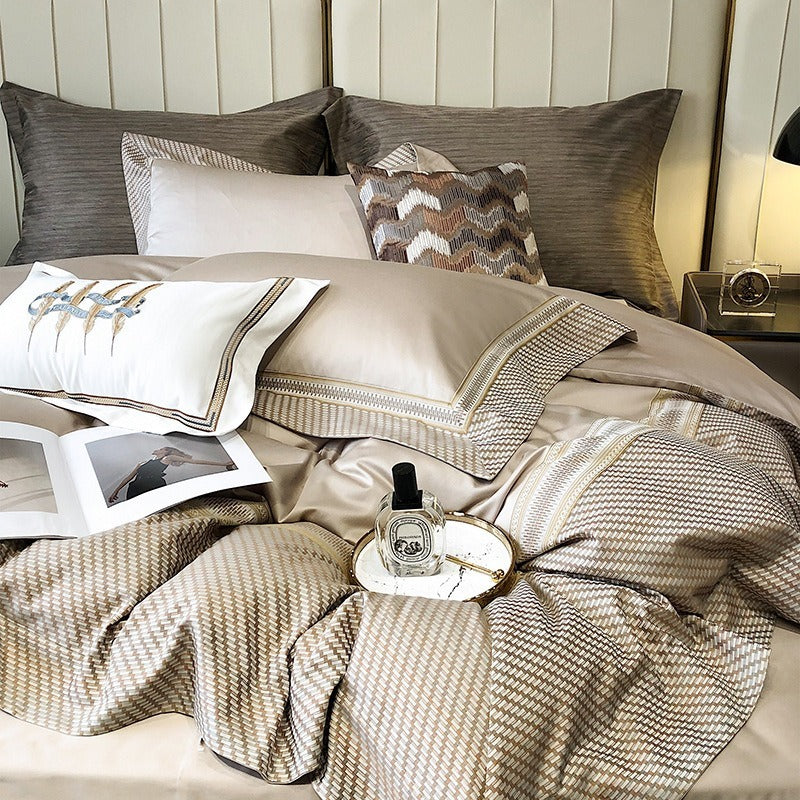 VILZSTUDIOS champagne and taupe satin bedding set with houndstooth borders and geometric ribbon trim