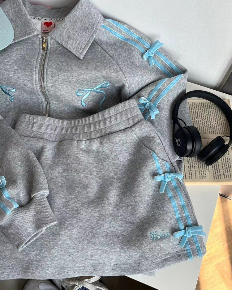 VILZSTUDIOS Stylish grey zip-up track jacket with blue stripes and bows