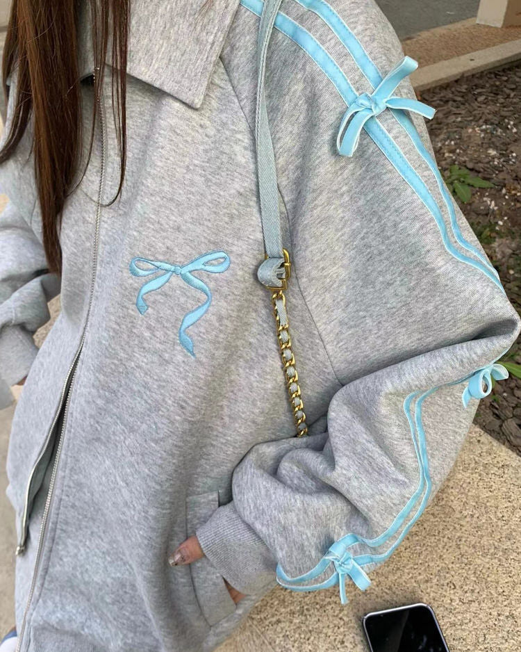 VILZSTUDIOS Stylish grey zip-up track jacket with blue stripes and bows
