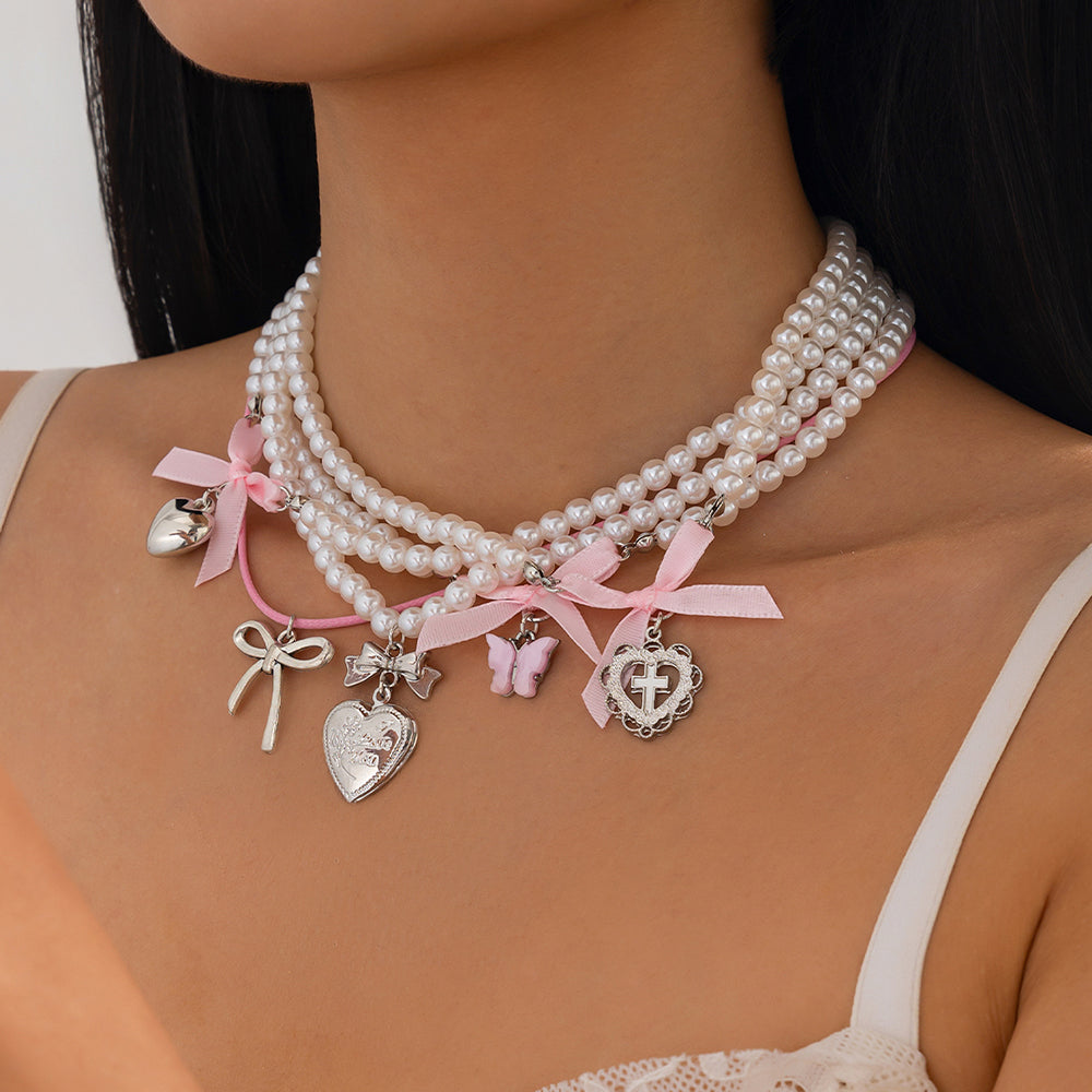 VILZSTUDIOS Layered pearl necklace set with charms and bows