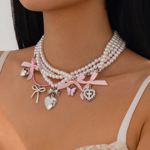 VILZSTUDIOS Layered pearl necklace set with charms and bows
