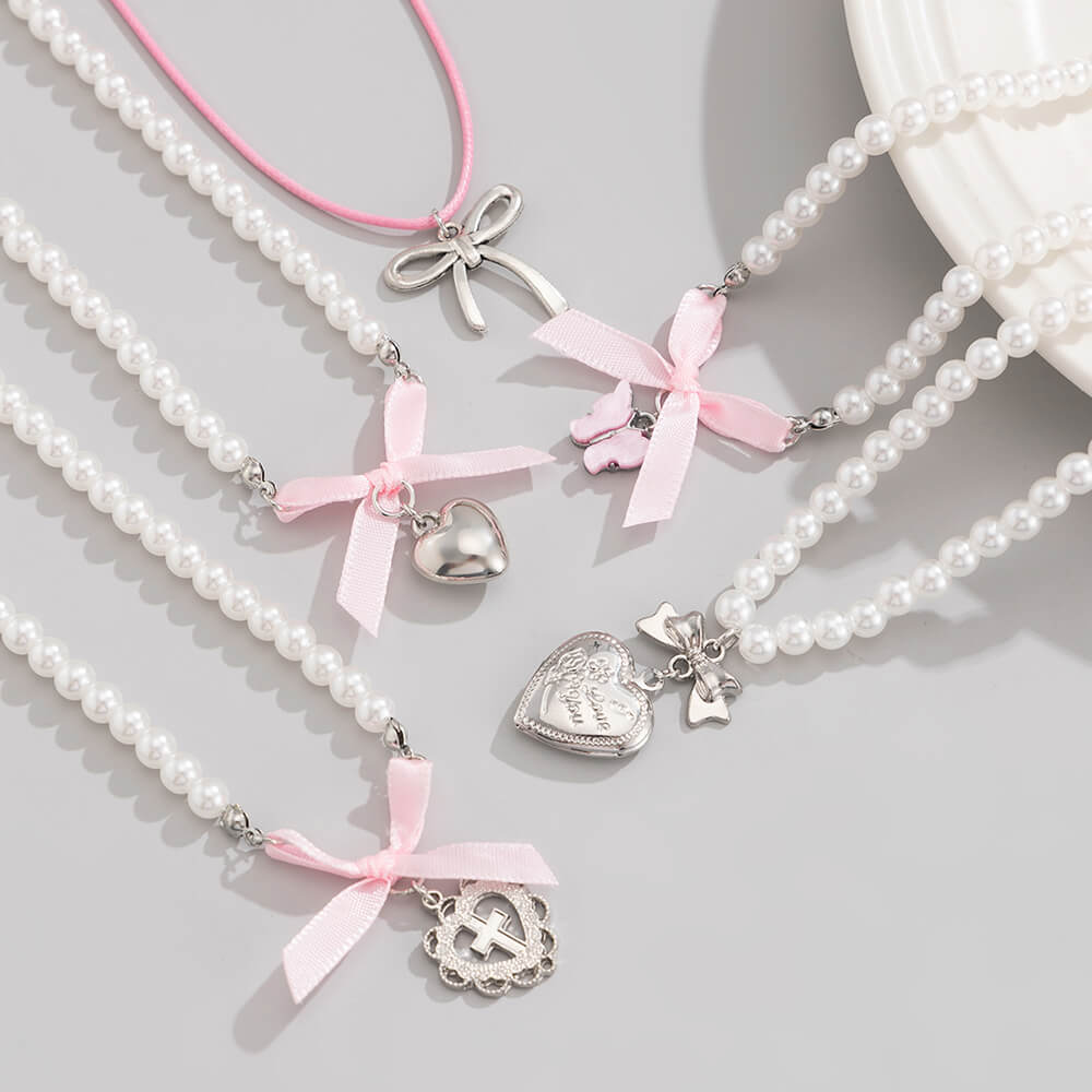 VILZSTUDIOS Layered pearl necklace set with charms and bows