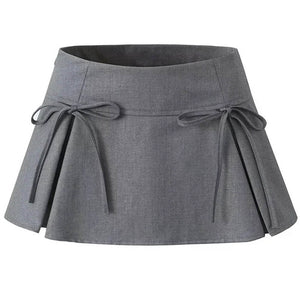 VILZSTUDIOS Pleated mini skirt with bow accents