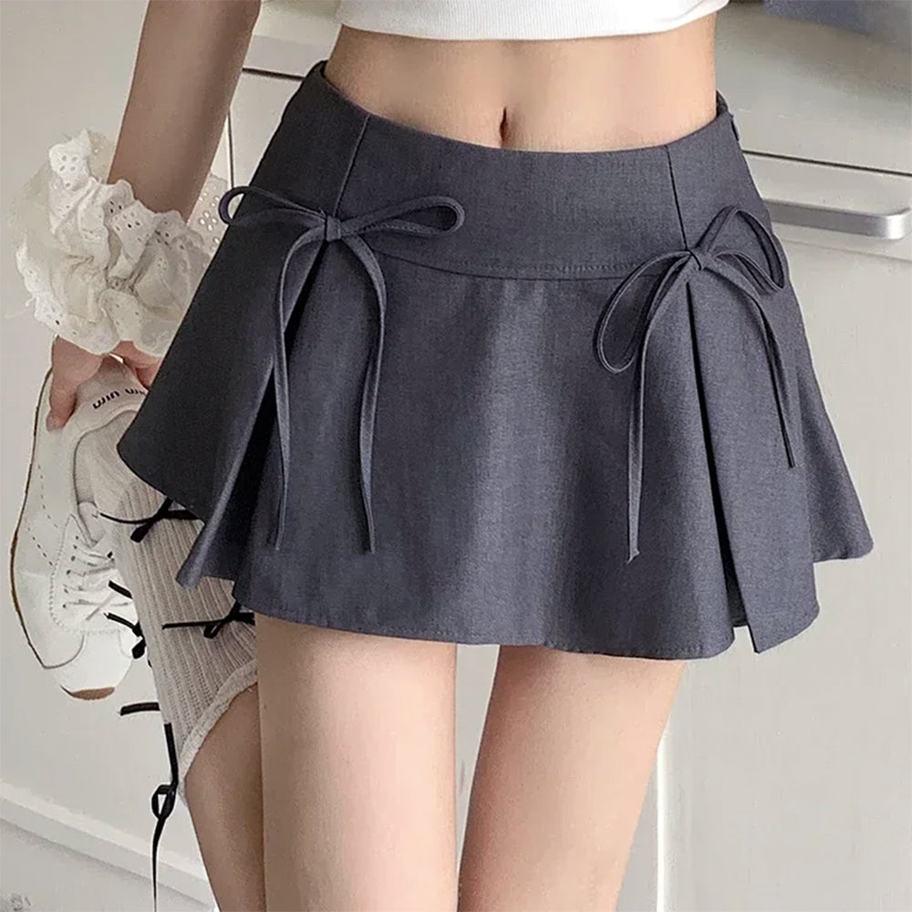VILZSTUDIOS Pleated mini skirt with bow accents