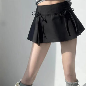 VILZSTUDIOS Pleated mini skirt with bow accents