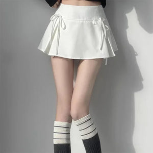 VILZSTUDIOS Pleated mini skirt with bow accents