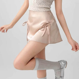 VILZSTUDIOS Chic satin mini skirt with bows by VILZSTUDIOS