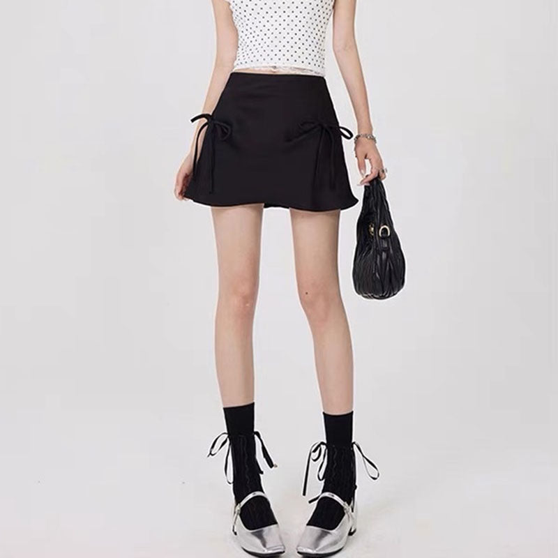 VILZSTUDIOS Chic satin mini skirt with bows by VILZSTUDIOS