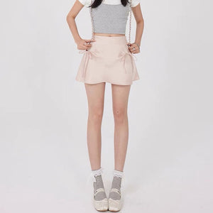 VILZSTUDIOS Chic satin mini skirt with bows by VILZSTUDIOS