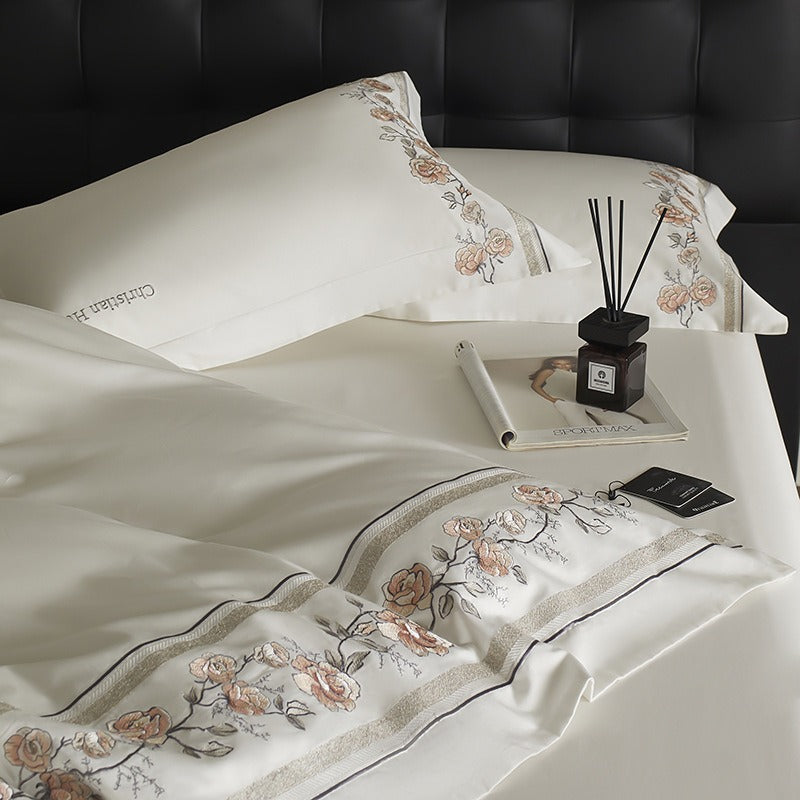 VILZSTUDIOS champagne satin duvet cover set with peach climbing rose embroidery and wide pillowcase borders