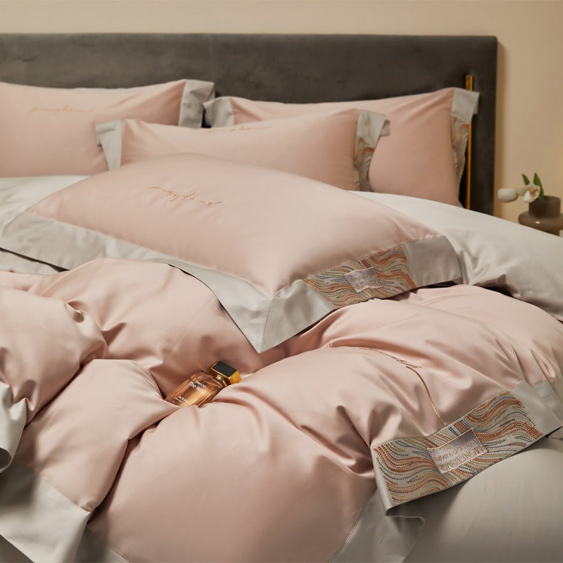 VILZSTUDIOS two-tone satin bedding set with broad contrasting borders and script embroidery