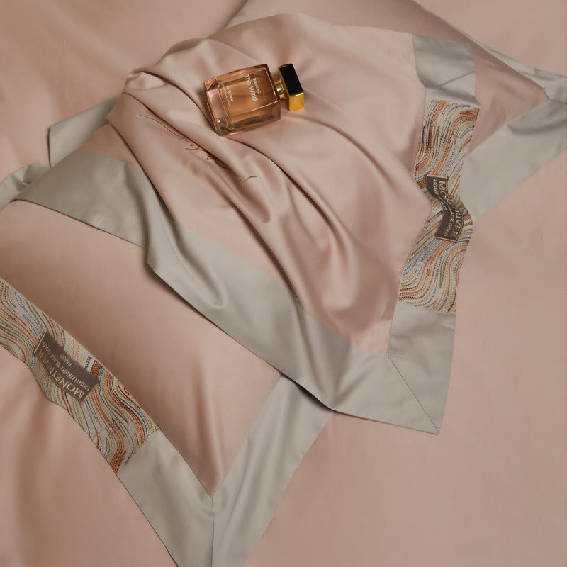 VILZSTUDIOS two-tone satin bedding set with broad contrasting borders and script embroidery