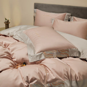 VILZSTUDIOS two-tone satin bedding set with broad contrasting borders and script embroidery