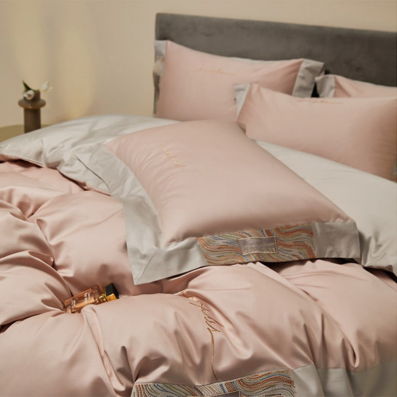 VILZSTUDIOS two-tone satin bedding set with broad contrasting borders and script embroidery