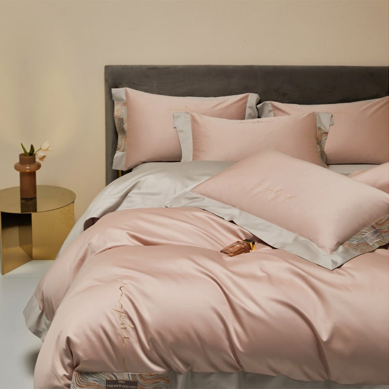 VILZSTUDIOS two-tone satin bedding set with broad contrasting borders and script embroidery