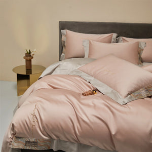 VILZSTUDIOS two-tone satin bedding set with broad contrasting borders and script embroidery