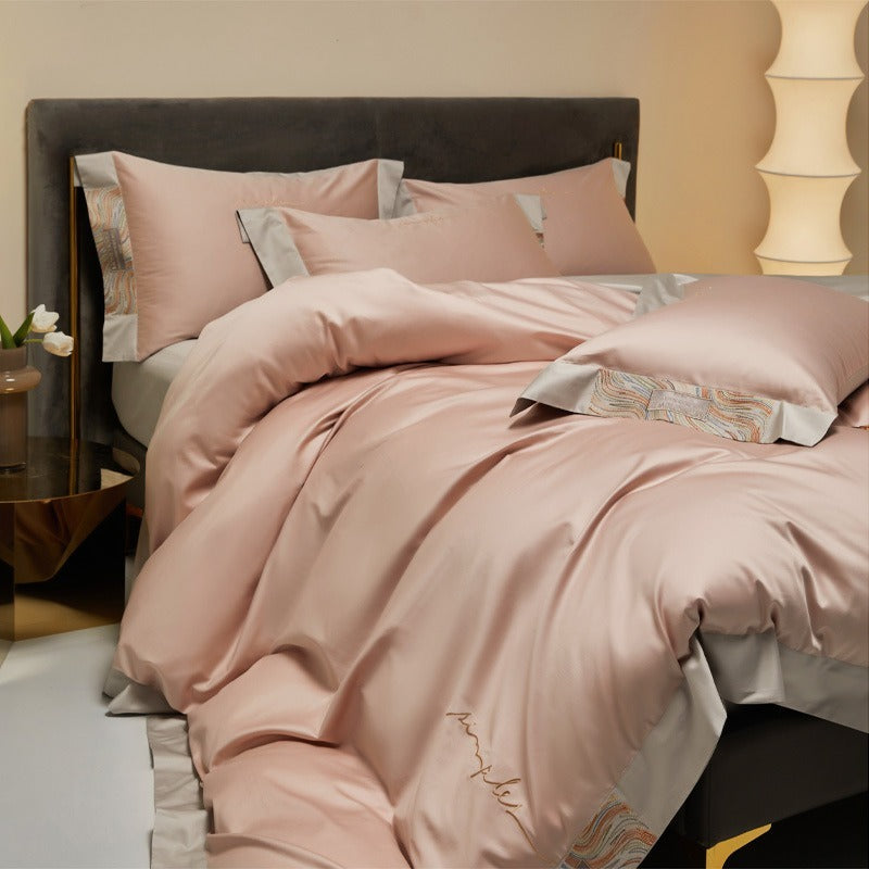 VILZSTUDIOS two-tone satin bedding set with broad contrasting borders and script embroidery