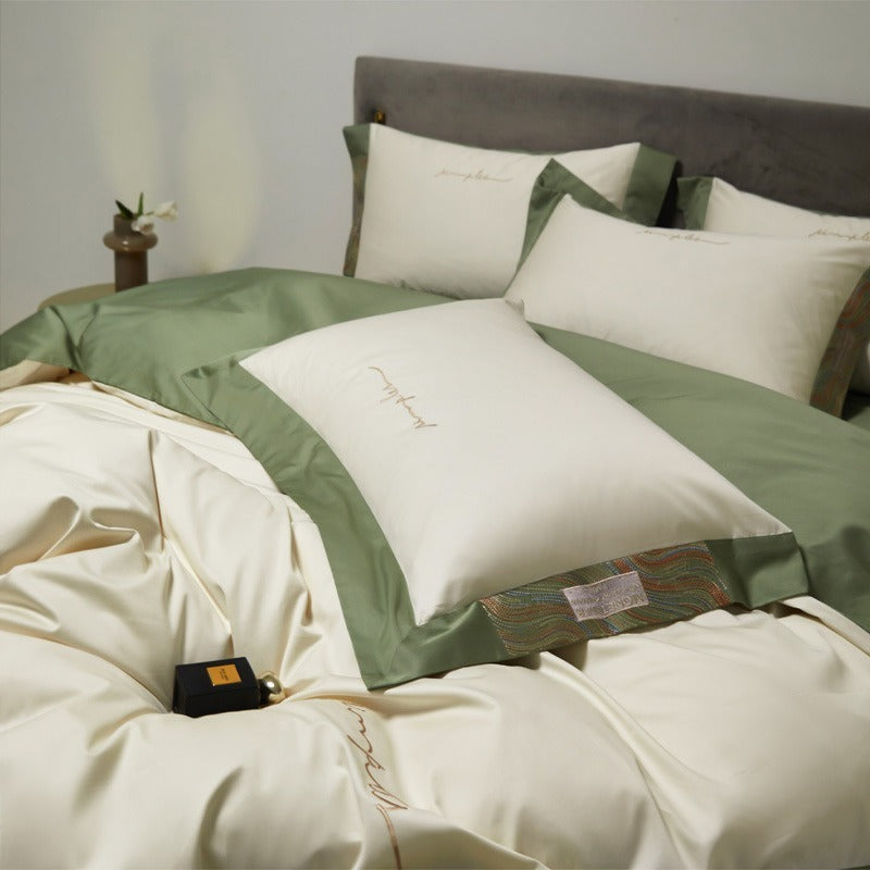 VILZSTUDIOS two-tone satin bedding set with broad contrasting borders and script embroidery