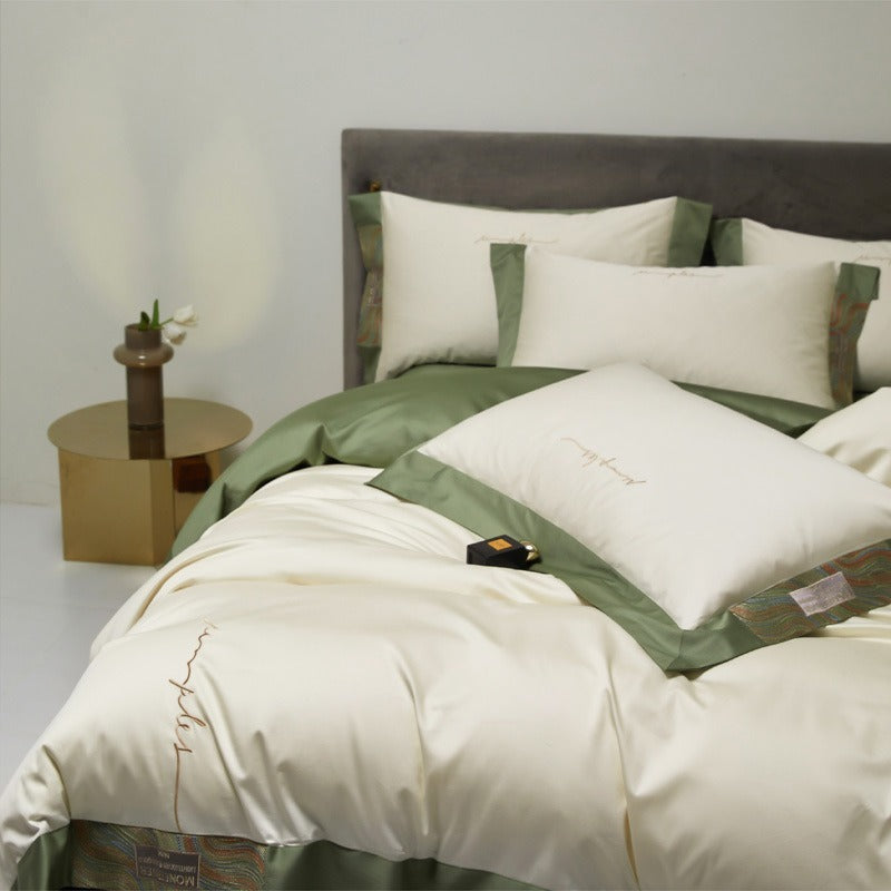 VILZSTUDIOS two-tone satin bedding set with broad contrasting borders and script embroidery