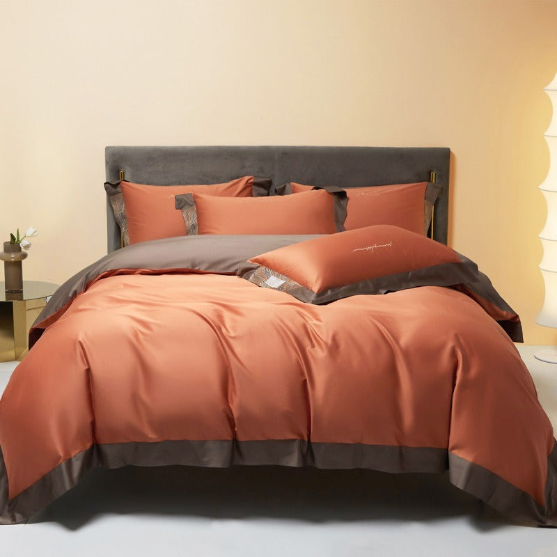 VILZSTUDIOS two-tone satin bedding set with broad contrasting borders and script embroidery