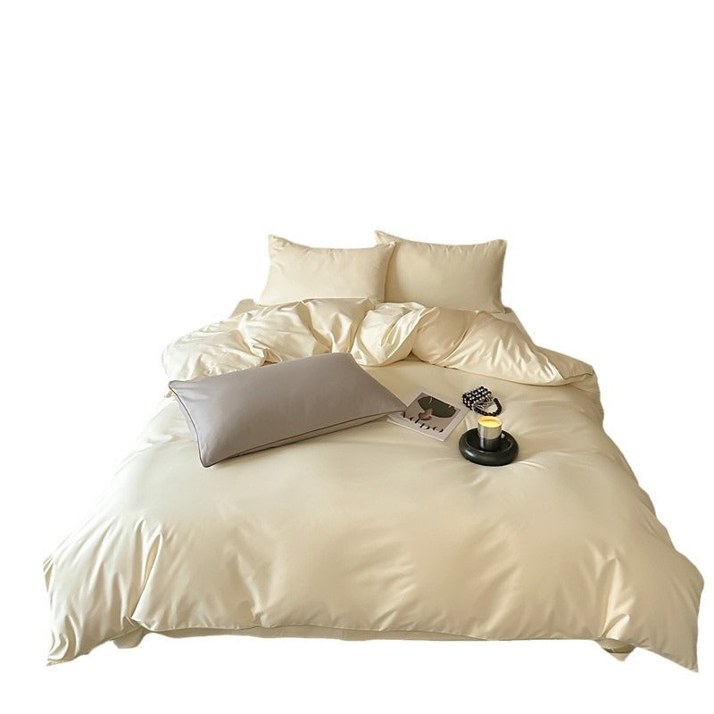 VILZSTUDIOS Neutral and pastel solid-color bedding set with contrast piping on the duvet cover and matching pillowcases