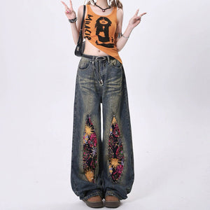 VILZSTUDIOS Wide leg jeans with space-themed patches