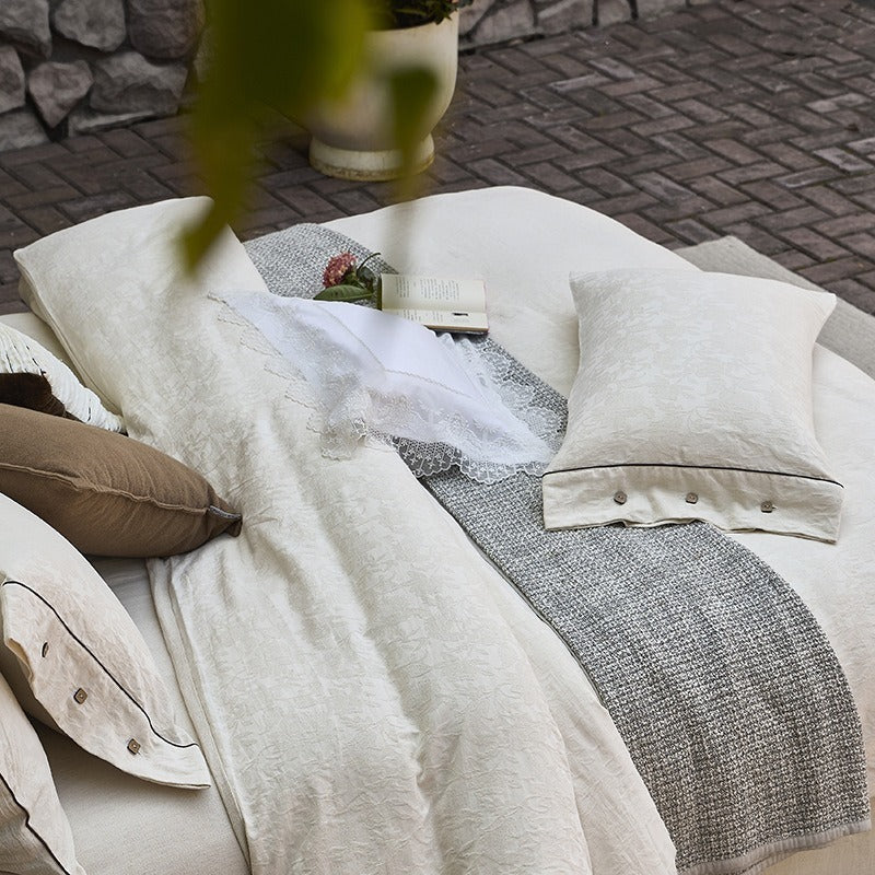 VILZSTUDIOS cream floral damask linen bedding set with dark piping and square buttons