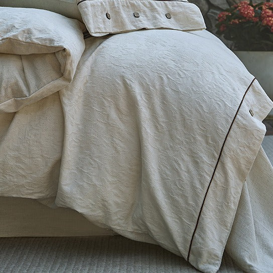 VILZSTUDIOS cream floral damask linen bedding set with dark piping and square buttons