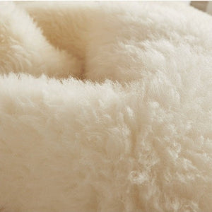 VILZSTUDIOS cream-white wool mattress pad with fluffy pile and diamond-quilted reverse