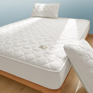 VILZSTUDIOS neutral cotton fitted sheet with diamond quilting and small floral motifs