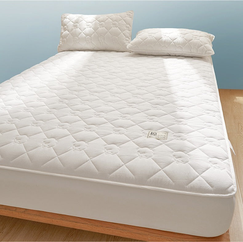 VILZSTUDIOS neutral cotton fitted sheet with diamond quilting and small floral motifs
