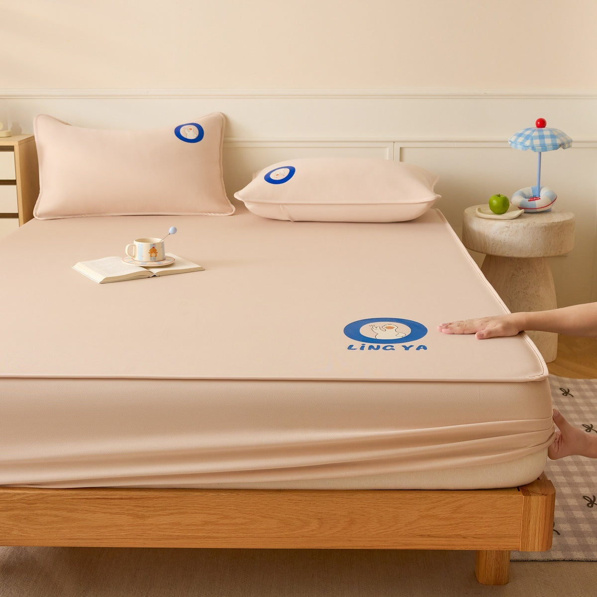 VILZSTUDIOS soft pink, cream white, light gray and warm beige fitted sheet options with blue cartoon duck graphic and piped edges