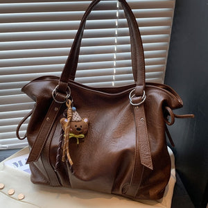 VILZSTUDIOS soft faux leather slouchy tote bag with embroidery charm