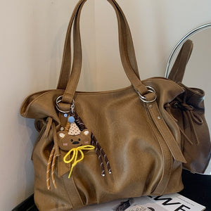 VILZSTUDIOS soft faux leather slouchy tote bag with embroidery charm