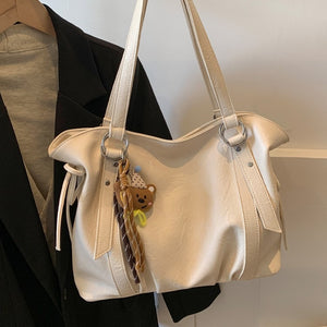 VILZSTUDIOS soft faux leather slouchy tote bag with embroidery charm