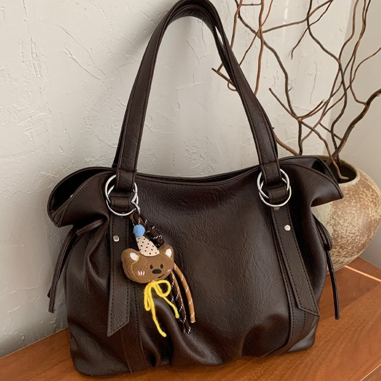 VILZSTUDIOS soft faux leather slouchy tote bag with embroidery charm