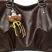 VILZSTUDIOS soft faux leather slouchy tote bag with embroidery charm