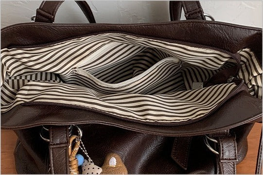 VILZSTUDIOS soft faux leather slouchy tote bag with embroidery charm
