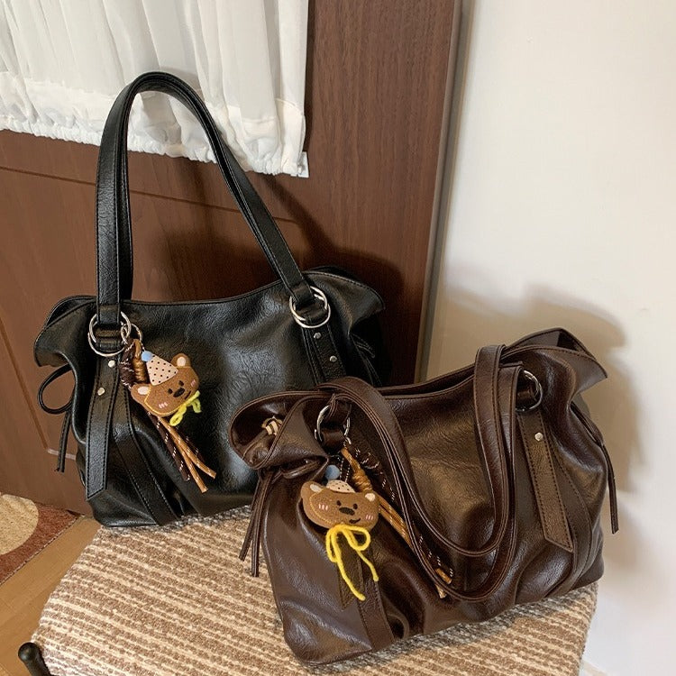 VILZSTUDIOS soft faux leather slouchy tote bag with embroidery charm