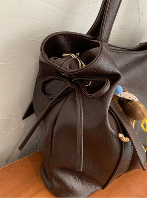 VILZSTUDIOS soft faux leather slouchy tote bag with embroidery charm
